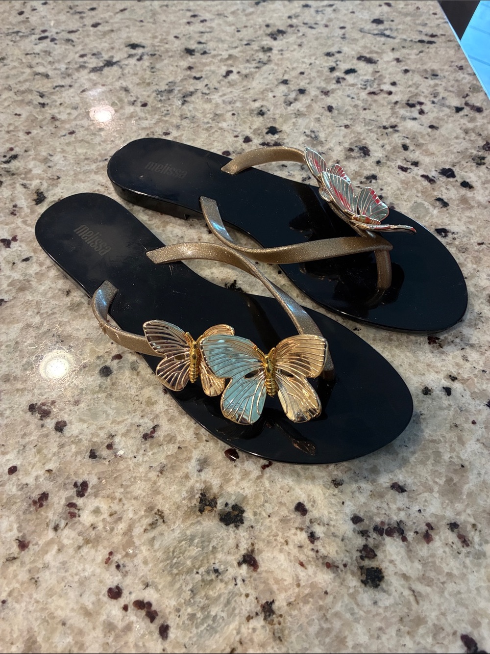 Melissa Black Sandals with Gold Straps and Butterfly Accents